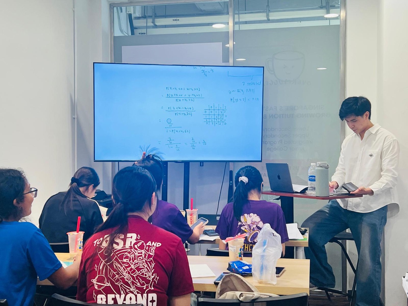 Mr Kieran Toh teaching a small-group Math class at Sterling Education Studio